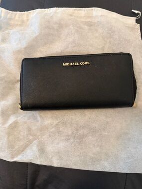 Michael Kors Black Zip-Around Saffiano Leather Wallet with Gold Logo